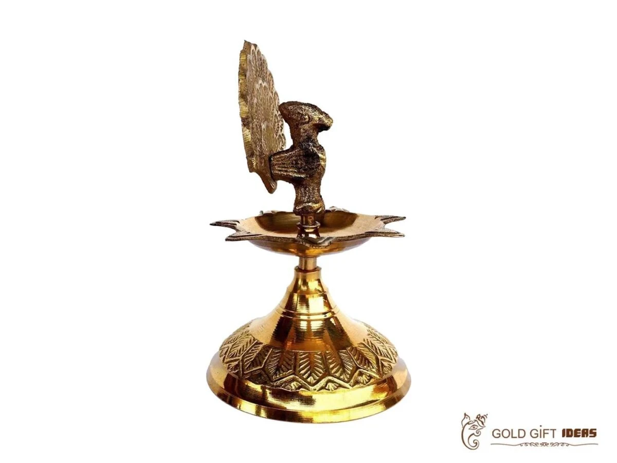 Brass peacock diya, brass peacock lamp, brass peacock diya stand, brass peacock oil lamp, brass diya for home, brass diya for temple, brass diya decoration, brass stand diya, brass diya stand, Brass Peacock Diya with Base, Diya for Pooja Room, Brass Step Peacock Diya