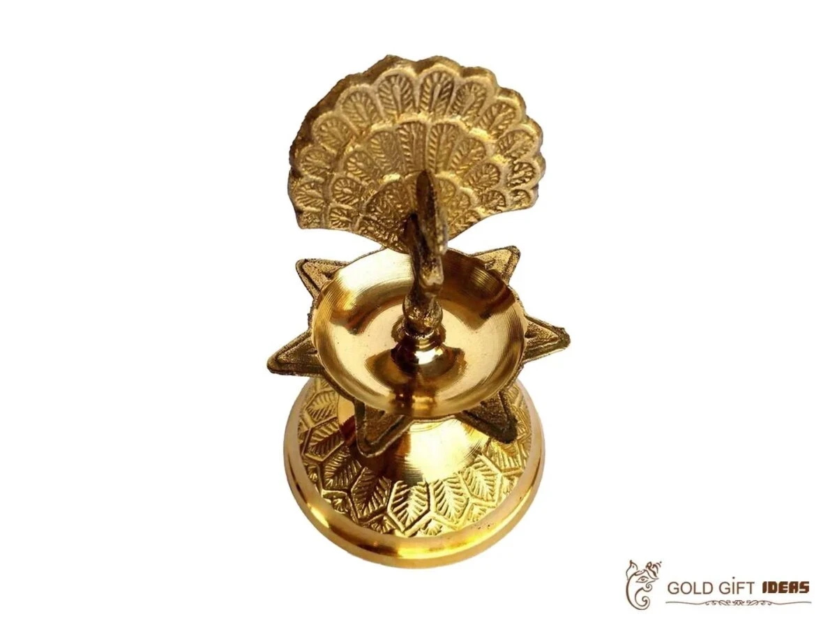 Brass peacock diya, brass peacock lamp, brass peacock diya stand, brass peacock oil lamp, brass diya for home, brass diya for temple, brass diya decoration, brass stand diya, brass diya stand, Brass Peacock Diya with Base, Diya for Pooja Room, Brass Step Peacock Diya