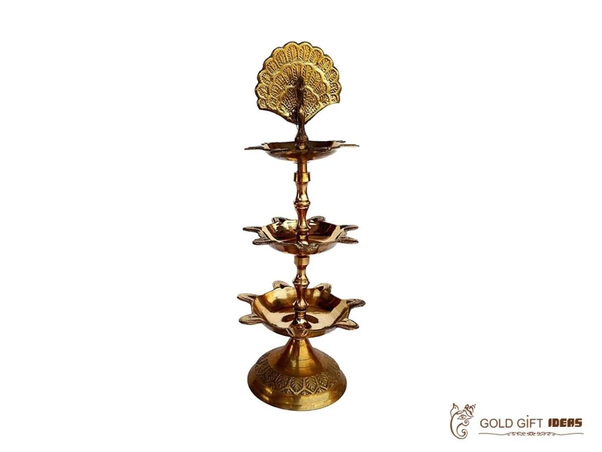 Brass peacock diya, brass peacock lamp, brass peacock diya stand, brass peacock oil lamp, brass diya for home, brass diya for temple, brass diya decoration, brass stand diya, brass diya stand, Brass Peacock Diya with Base, Diya for Pooja Room, Brass Step Peacock Diya