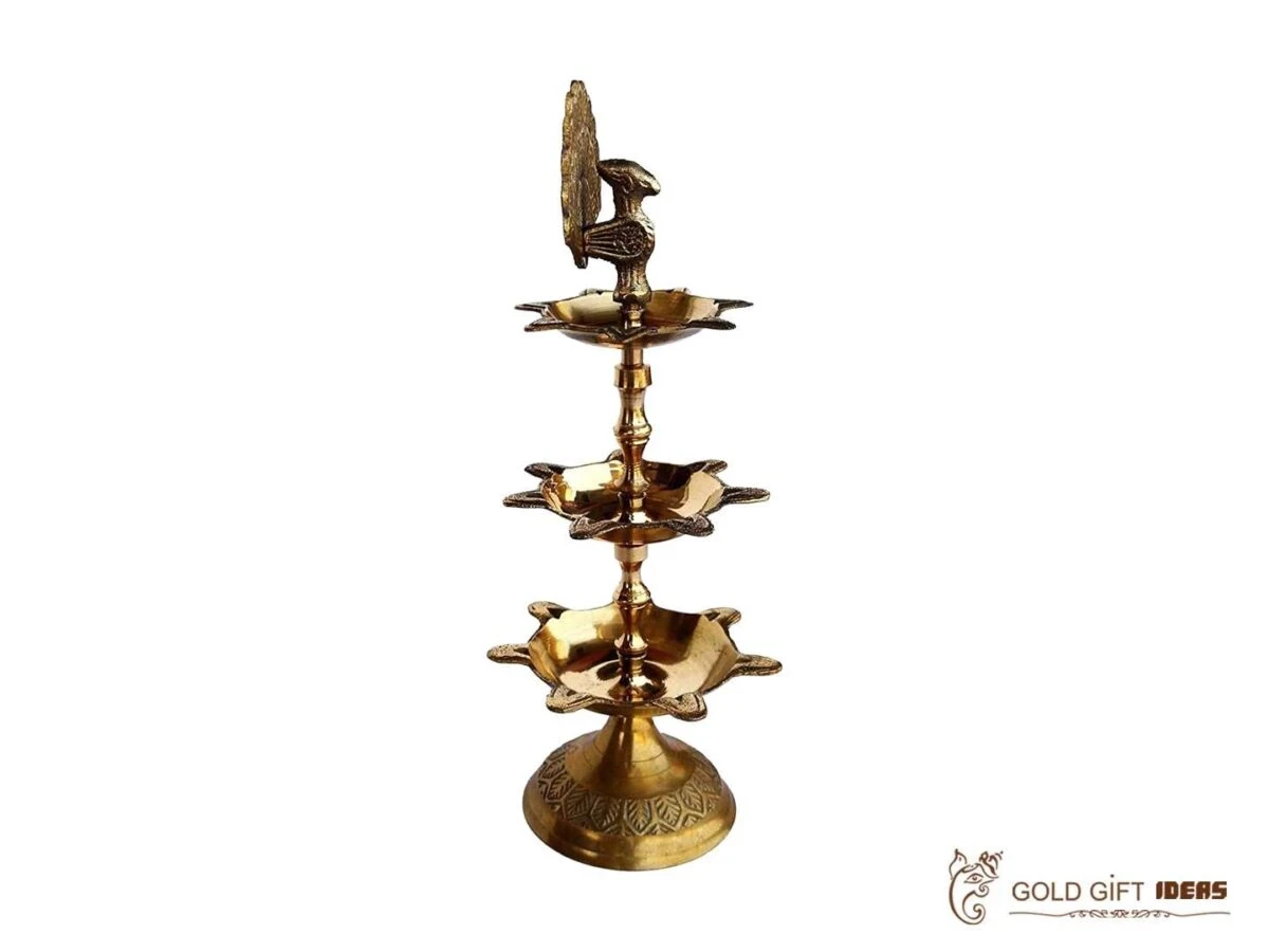 Brass peacock diya, brass peacock lamp, brass peacock diya stand, brass peacock oil lamp, brass diya for home, brass diya for temple, brass diya decoration, brass stand diya, brass diya stand, Brass Peacock Diya with Base, Diya for Pooja Room, Brass Step Peacock Diya