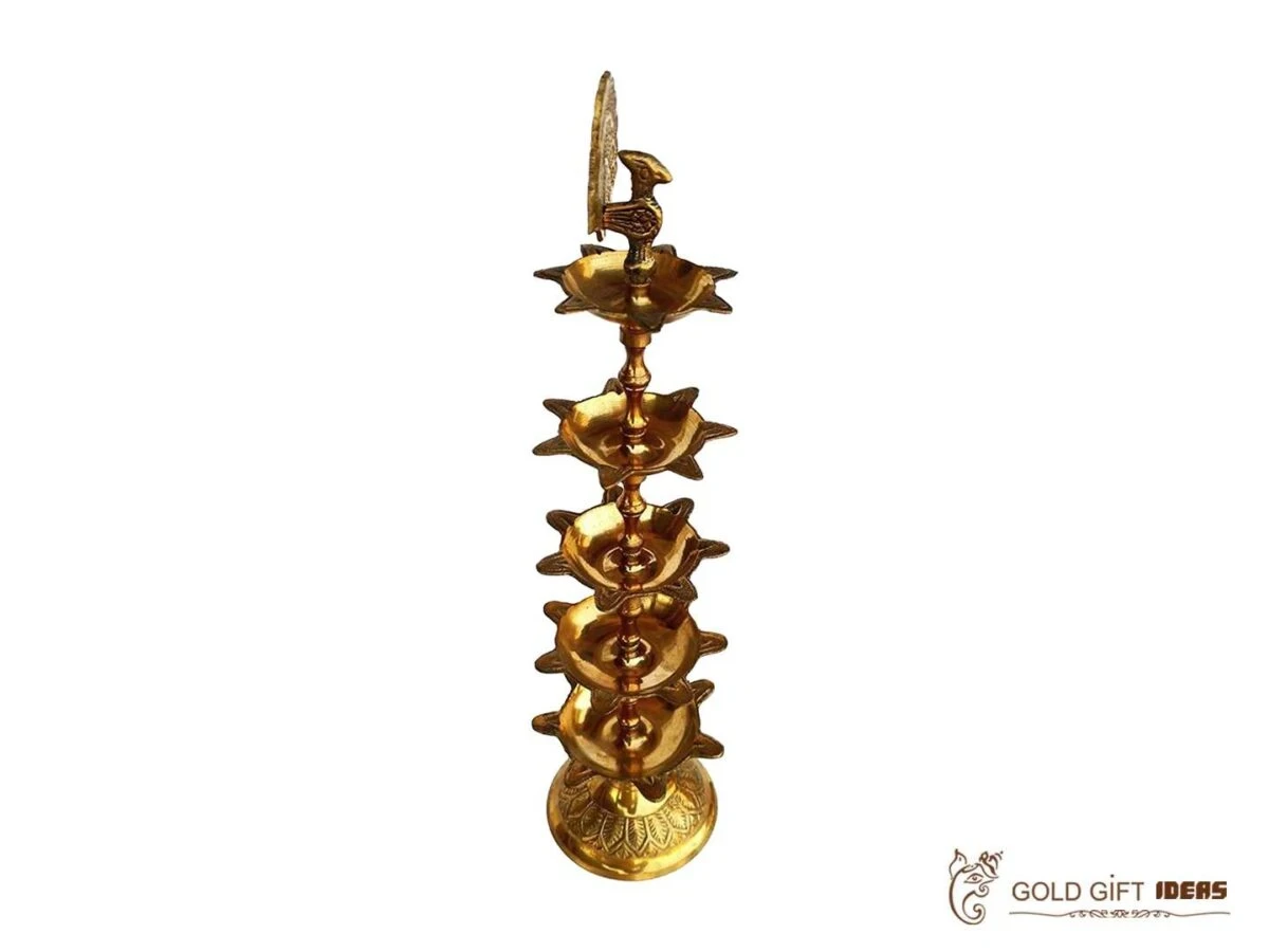 Brass peacock diya, brass peacock lamp, brass peacock diya stand, brass peacock oil lamp, brass diya for home, brass diya for temple, brass diya decoration, brass stand diya, brass diya stand, Brass Peacock Diya with Base, Diya for Pooja Room, Brass Step Peacock Diya