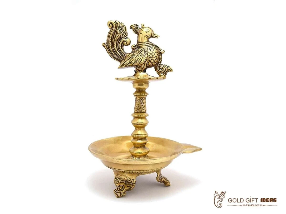 Brass peacock diya, brass peacock lamp, brass peacock diya stand, brass peacock oil lamp, brass diya for home, brass diya for temple, brass diya decoration, brass stand diya, brass diya stand, Brass Peacock Diya with Base, Diya for Pooja Room