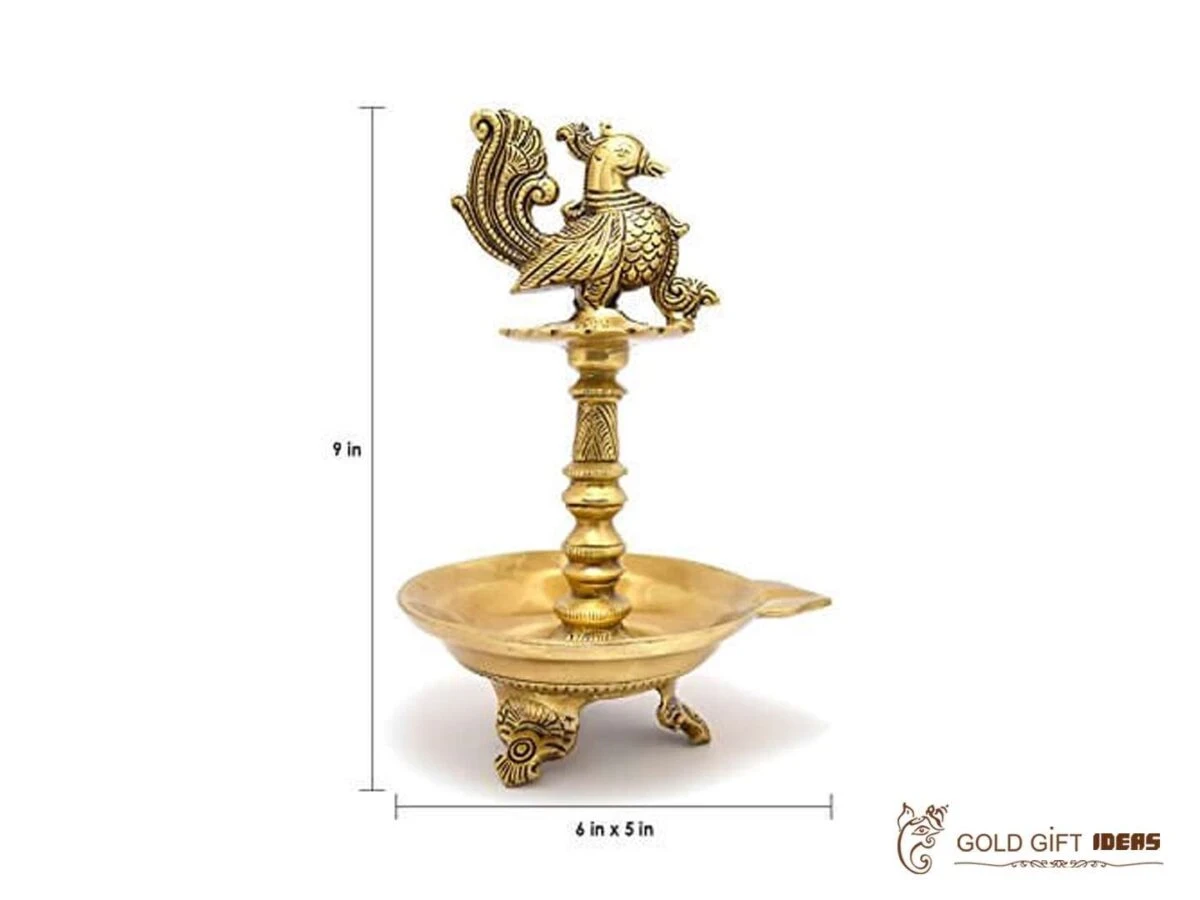 Brass peacock diya, brass peacock lamp, brass peacock diya stand, brass peacock oil lamp, brass diya for home, brass diya for temple, brass diya decoration, brass stand diya, brass diya stand, Brass Peacock Diya with Base, Diya for Pooja Room