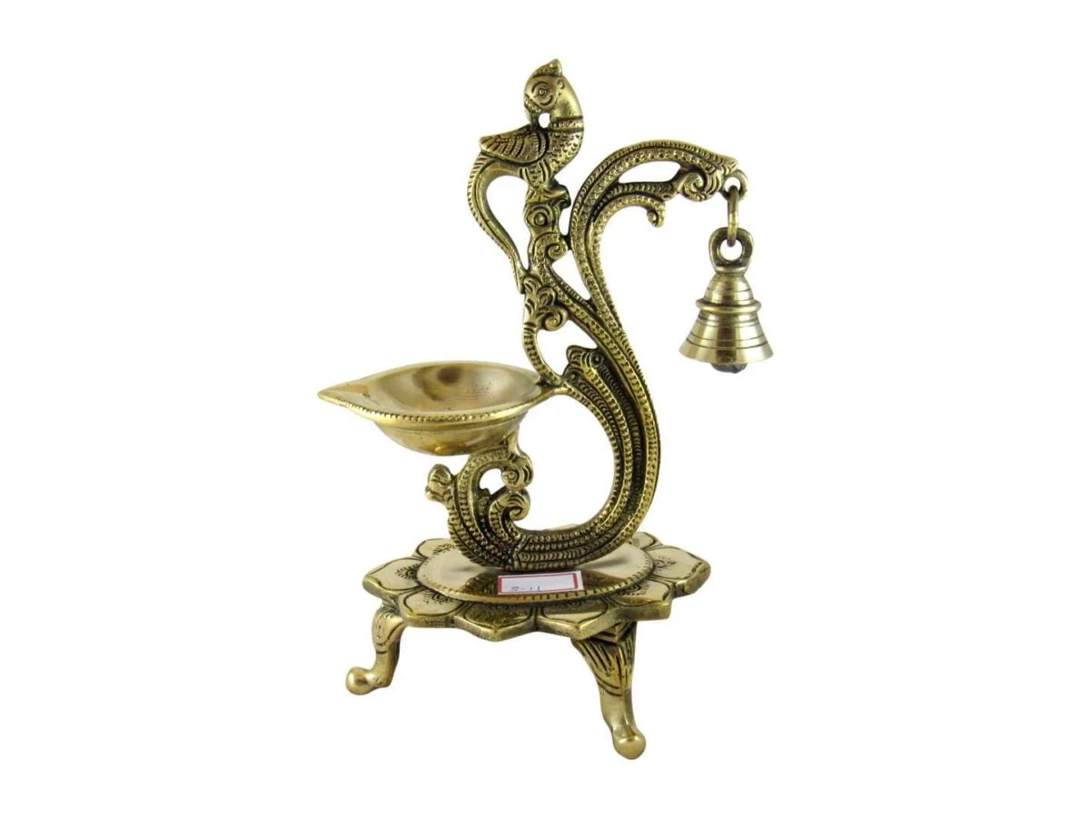 Brass peacock diya, brass peacock lamp, brass peacock diya stand, brass peacock oil lamp, brass diya for home, brass diya for temple, brass diya decoration, brass stand diya, brass diya stand, Brass Peacock Diya with Base, Diya for Pooja Room