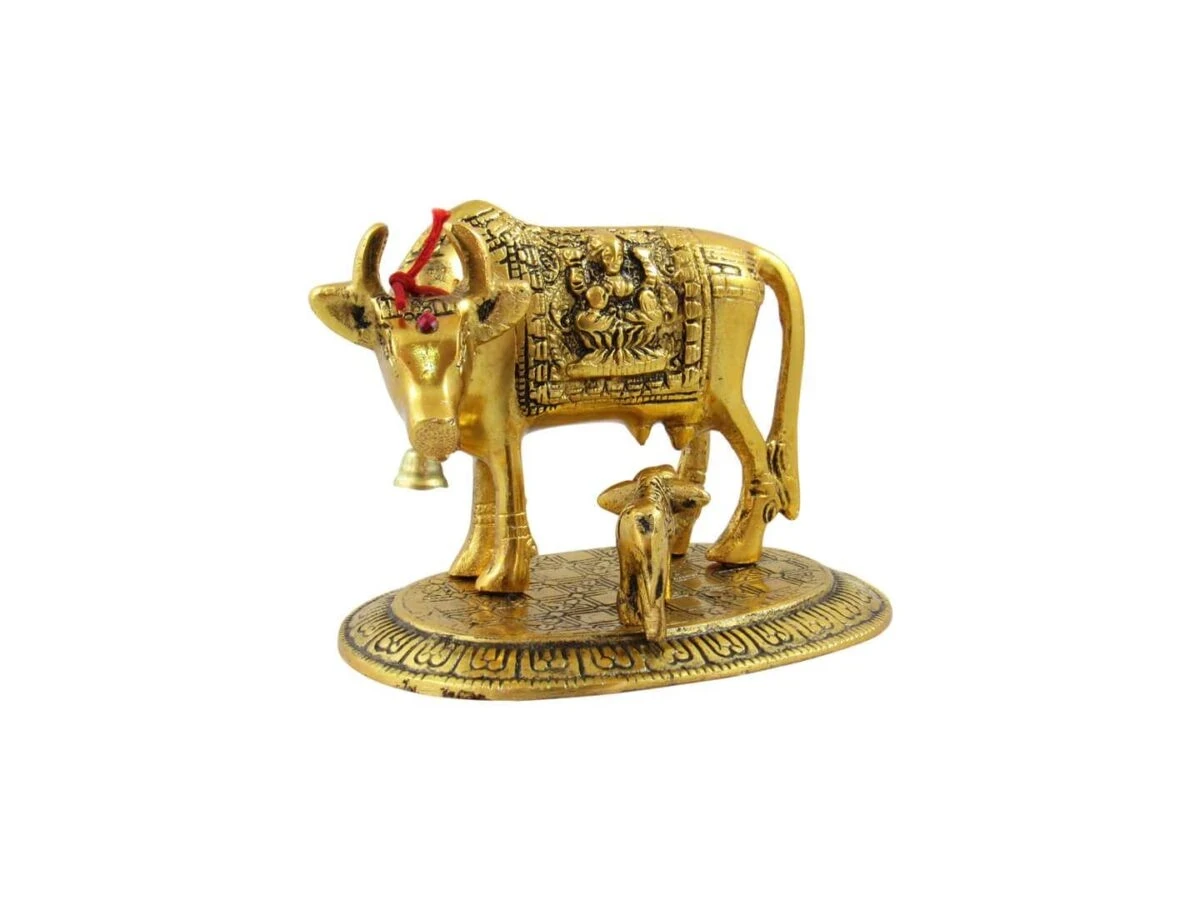 White metal cow and calf, cow and calf statue, cow and calf idol vastu, cow and calf statue in pooja room, white metal cow and calf statue, white metal small cow