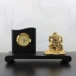 Ganesha idol with clock White metal ganesh idol white metal statue ganesha idol for home ganesha idol for office ganesha idol gift ganesha murti for car ganesh statue for temple ganesh statue for gift ganesh statue for home decoration