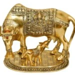 White metal cow and calf, cow and calf statue, cow and calf idol vastu, cow and calf statue in pooja room, white metal cow and calf statue, white metal small cow