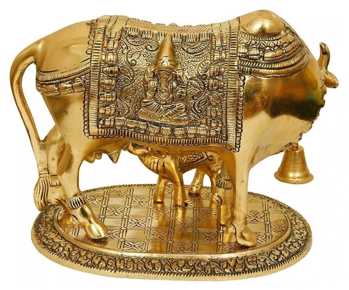 White metal cow and calf, cow and calf statue, cow and calf idol vastu, cow and calf statue in pooja room, white metal cow and calf statue, white metal small cow
