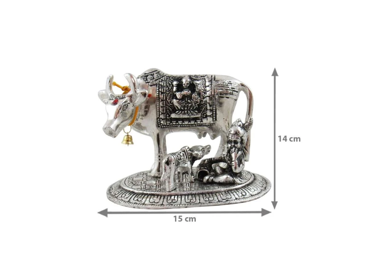 White metal cow and calf, cow and calf statue, cow and calf idol vastu, cow and calf statue in pooja room, white metal cow and calf statue, white metal small cow