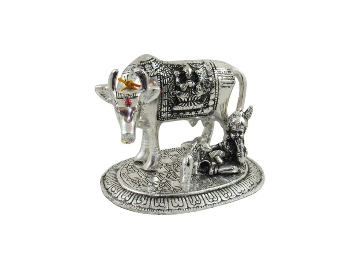 White metal cow and calf, cow and calf statue, cow and calf idol vastu, cow and calf statue in pooja room, white metal cow and calf statue, white metal small cow