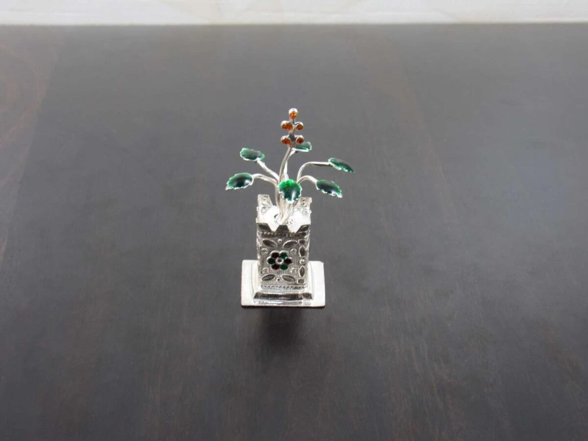 Pure silver Tulsi plant, silver tulsi kyaro, silver tulsi plant, pure silver tulsi plant return gifts, silver tulsi leaf, pure silver pooja items, pure silver gift items, pure silver gift items for marriage, pure silver gift items for housewarming, pure silver gift articles