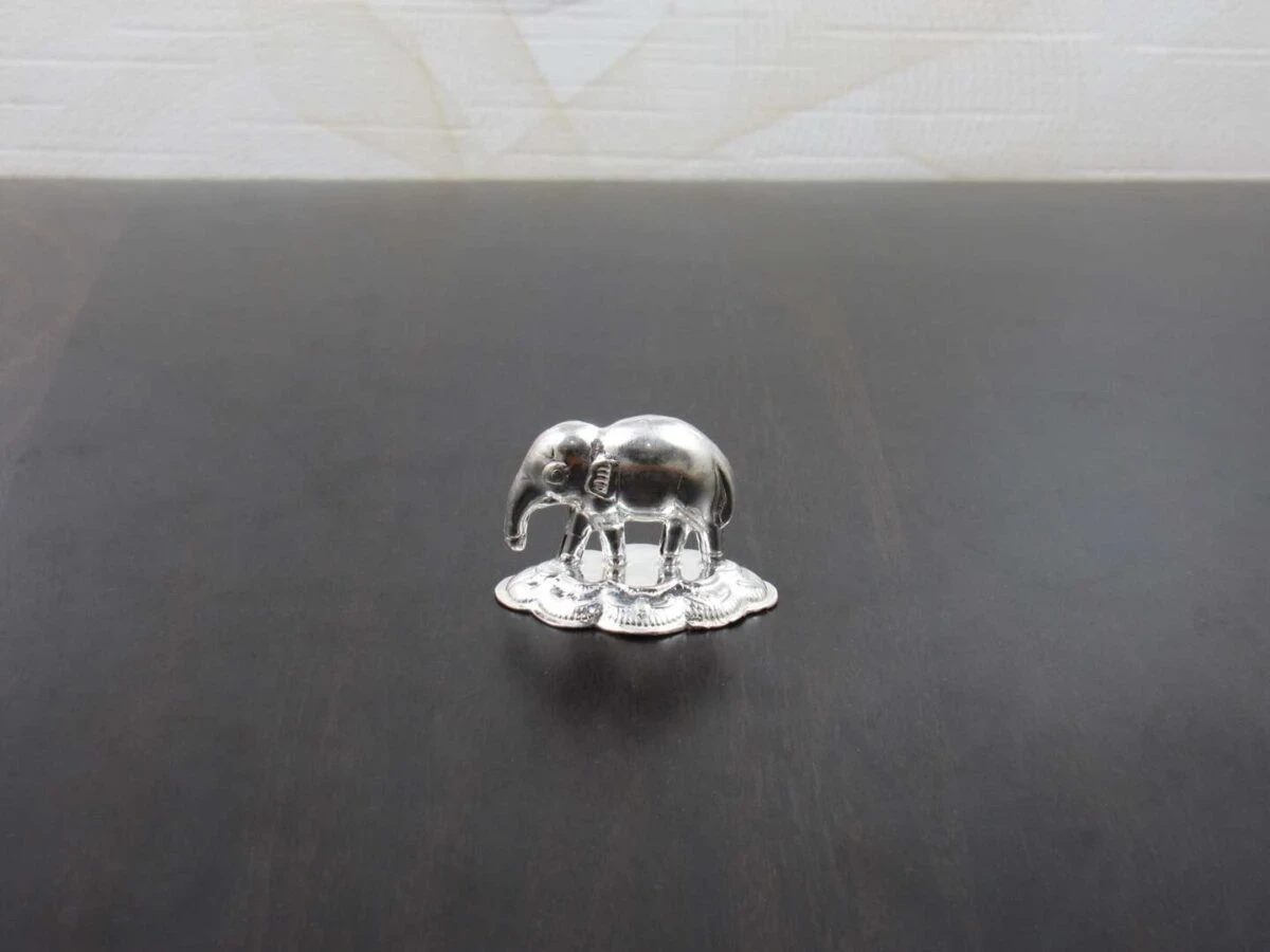 pure silver elephant, pure silver elephant idol, pure silver elephant statue, buy pure silver elephant online, silver elephant statue price, pure silver elephant idol vastu, silver elephant idol puja, silver elephant showpiece