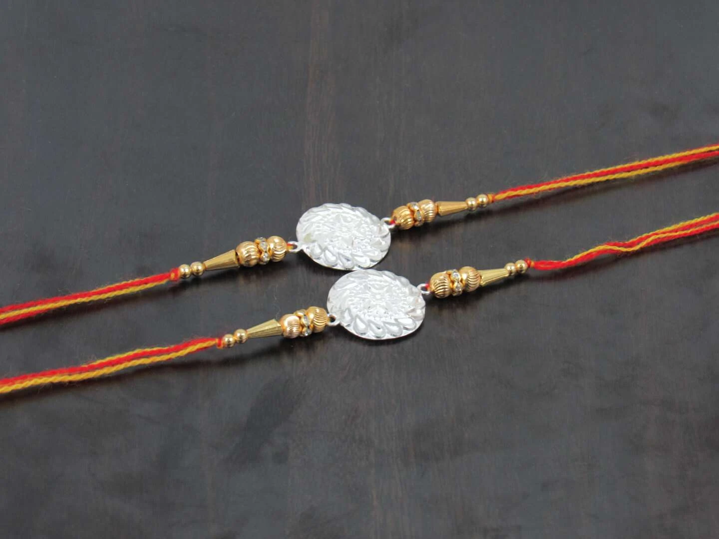 GOLDGIFTIDEAS Pure 999 Silver Nakshi Swastik Rakhi for Brother/Bhaiya (Set  of 3), Silver Rakhi for Rakshabandhan with Dabbi