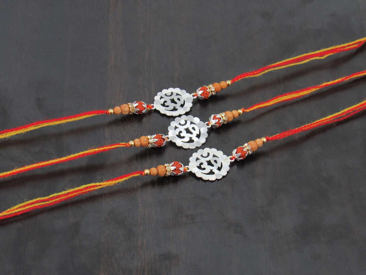 Silver Nakshi OM Rakhi for Brother (3) om rakhi, om rakhi silver, silver om rakhi, pure silver om rakhi, rakhi for brother, rakhi for brother and bhabhi, rakhi set for brother, rakhi set of 3, rakhi for bhaiya and bhabhi, rakhi for bhaiya, rakhi for sister, rakhi set for brother, silver rakhi for bhai, silver rakhi for men, silver rakhi bracelet for brother, silver rakhi for brother, silver rakhi for bhaiya, silver rakhi for raksha bandhan, fancy silver rakhi, silver rakhi with thread, rakshabandhan rakhi, rakhi for brother set of 2, rakhi for brother silver, sterling silver rakhi, pure silver rakhi, pure silver rakhi for brother, pure silver rakhi for bhai, pure silver rakhi bracelet for brother, rakhi combo set, bhai bhabhi rakhi set, silver rakhi with rudraksha