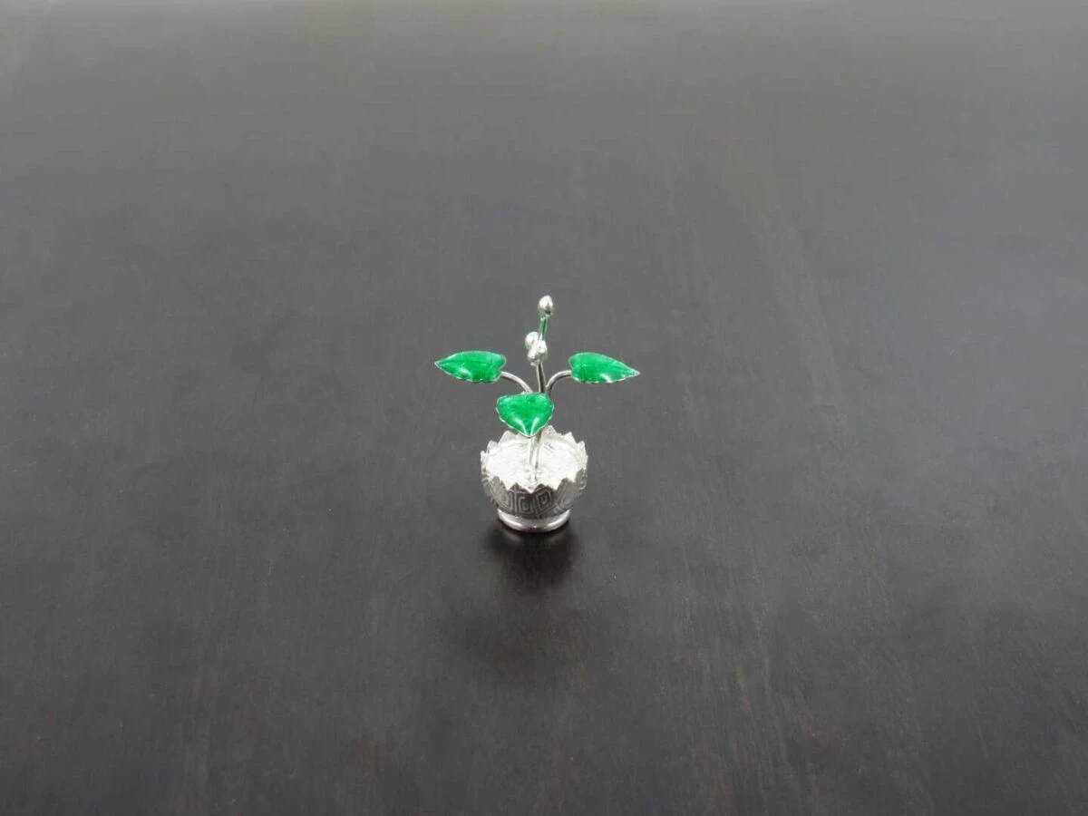 Pure silver Tulsi plant, silver tulsi kyaro, silver tulsi plant, pure silver tulsi plant return gifts, silver tulsi leaf, pure silver pooja items, pure silver gift items, pure silver gift items for marriage, pure silver gift items for housewarming, pure silver gift articles