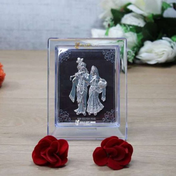 Silver Radha Krishna photo frame, radha Krishna silver frame silver radha krishna idol silver gift items return gifts for housewarming silver pooja items silver gift articles Radha Krishna photo frame, radha Krishna photo frame gift, Radha Krishna wooden frame, Radha Krishna frame with charan paduka, return gifts for wedding, return gifts for pooja