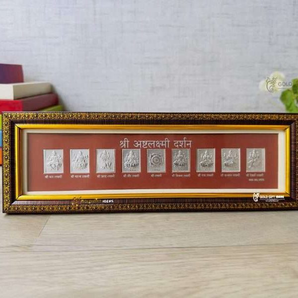 Lakshmi photo frame, silver lakshmi frame, silver lakshmi photo frame, silver laxmi frame silver gift items return gifts for housewarming silver pooja items silver gift articles Lakshmi photo frame, lakshmi devi photo frames, goddess lakshmi photo frame, lakshmi frame with charan paduka, mahalaxmi photo frame, Kolhapur mahalaxmi photo frame, return gifts for Diwali, photo frame for gift religious frame for worship, return gifts