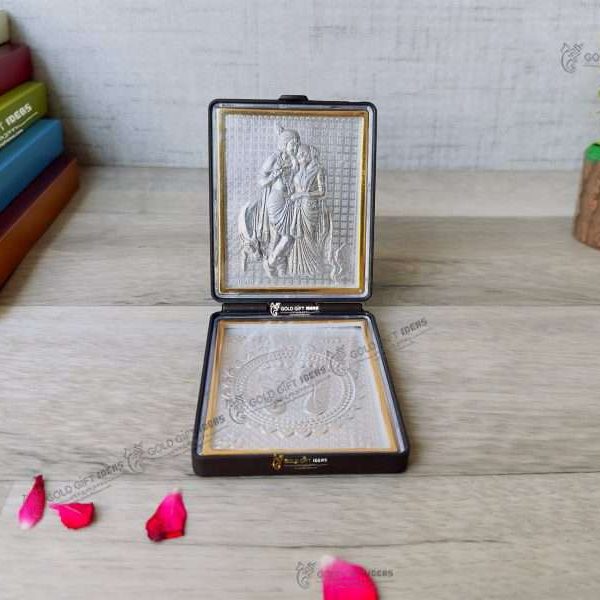 Silver Radha Krishna photo frame, radha Krishna silver frame silver radha krishna idol silver gift items return gifts for housewarming silver pooja items silver gift articles Radha Krishna photo frame, radha Krishna photo frame gift, radha Krishna wooden frame, radha Krishna frame with charan paduka, return gifts for wedding, return gifts for pooja