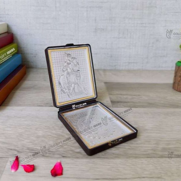 Silver Radha Krishna photo frame, radha Krishna silver frame silver radha krishna idol silver gift items return gifts for housewarming silver pooja items silver gift articles Radha Krishna photo frame, radha Krishna photo frame gift, radha Krishna wooden frame, radha Krishna frame with charan paduka, return gifts for wedding, return gifts for pooja
