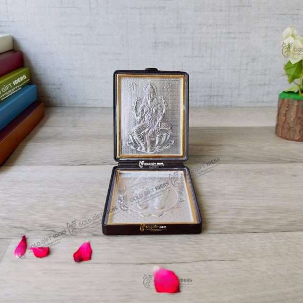 Lakshmi photo frame, silver lakshmi frame, silver lakshmi photo frame, silver laxmi frame silver gift items return gifts for housewarming silver pooja items silver gift articles Lakshmi photo frame, lakshmi devi photo frames, goddess lakshmi photo frame, lakshmi frame with charan paduka, mahalaxmi photo frame, Kolhapur mahalaxmi photo frame, return gifts for Diwali, photo frame for gift religious frame for worship, return gifts