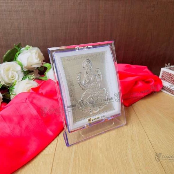 Lakshmi photo frame, silver lakshmi frame, silver lakshmi photo frame, silver laxmi frame silver gift items return gifts for housewarming silver pooja items silver gift articles Lakshmi photo frame, lakshmi devi photo frames, goddess lakshmi photo frame, lakshmi frame with charan paduka, mahalaxmi photo frame, Kolhapur mahalaxmi photo frame, return gifts for Diwali, photo frame for gift religious frame for worship, return gifts