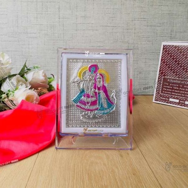 Silver Radha Krishna photo frame, radha Krishna silver frame silver radha krishna idol silver gift items return gifts for housewarming silver pooja items silver gift articles Radha Krishna photo frame, radha Krishna photo frame gift, radha Krishna wooden frame, radha Krishna frame with charan paduka, return gifts for wedding, return gifts for pooja