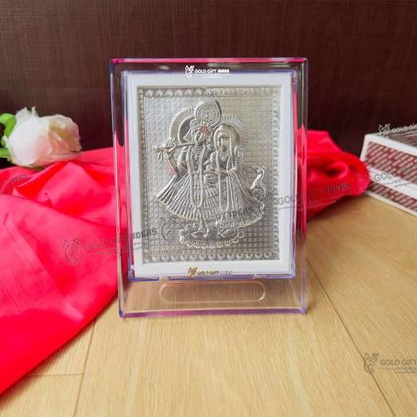Silver Radha Krishna photo frame, radha Krishna silver frame silver radha krishna idol silver gift items return gifts for housewarming silver pooja items silver gift articles Radha Krishna photo frame, radha Krishna photo frame gift, radha Krishna wooden frame, radha Krishna frame with charan paduka, return gifts for wedding, return gifts for pooja