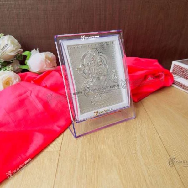 Silver Radha Krishna photo frame, radha Krishna silver frame silver radha krishna idol silver gift items return gifts for housewarming silver pooja items silver gift articles Radha Krishna photo frame, radha Krishna photo frame gift, radha Krishna wooden frame, radha Krishna frame with charan paduka, return gifts for wedding, return gifts for pooja