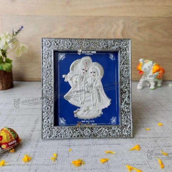 Silver Radha Krishna photo frame, radha Krishna silver frame silver radha krishna idol silver gift items return gifts for housewarming silver pooja items silver gift articles Radha Krishna photo frame, radha Krishna photo frame gift, radha Krishna wooden frame, radha Krishna frame with charan paduka, return gifts for wedding, return gifts for pooja