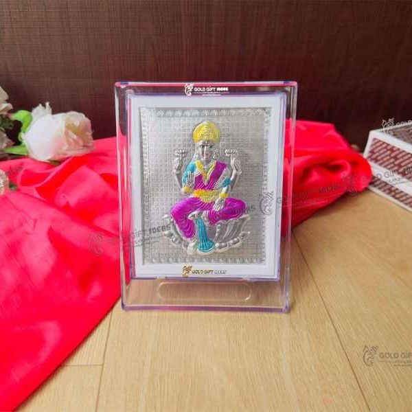 Lakshmi photo frame, silver lakshmi frame, silver lakshmi photo frame, silver laxmi frame silver gift items return gifts for housewarming silver pooja items silver gift articles Lakshmi photo frame, lakshmi devi photo frames, goddess lakshmi photo frame, lakshmi frame with charan paduka, mahalaxmi photo frame, Kolhapur mahalaxmi photo frame, return gifts for Diwali, photo frame for gift religious frame for worship, return gifts