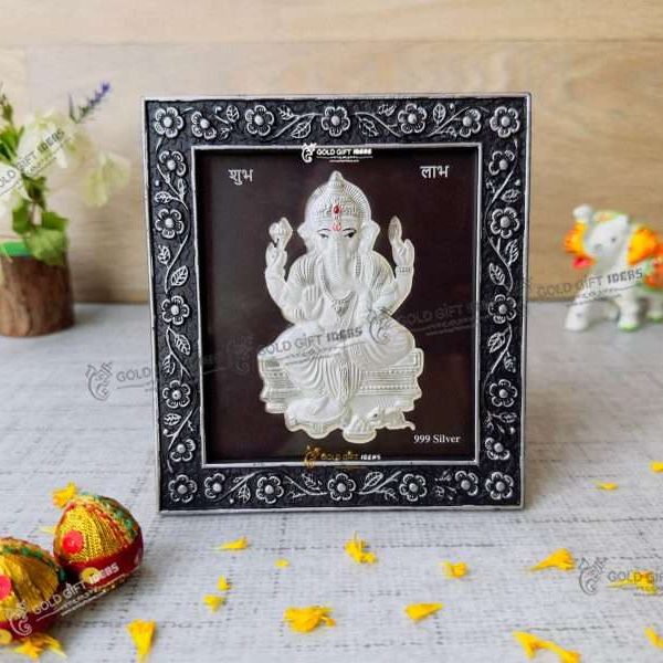 999 silver Ganesh frame, silver Ganesh photo frame, pure silver god photo frames, ganesha photo frame, silver ganesha frame, gold Ganesha frame, lord Ganesha frame, Ganesha frame with charan paduka, return gifts, Ganesha wooden photo frame, ganpati photo frame, Ganesh photo with mantra, ganesh photo with frame, ganesh photo with name, Ganpati photo hd, return gifts for wedding, return gifts for pooja