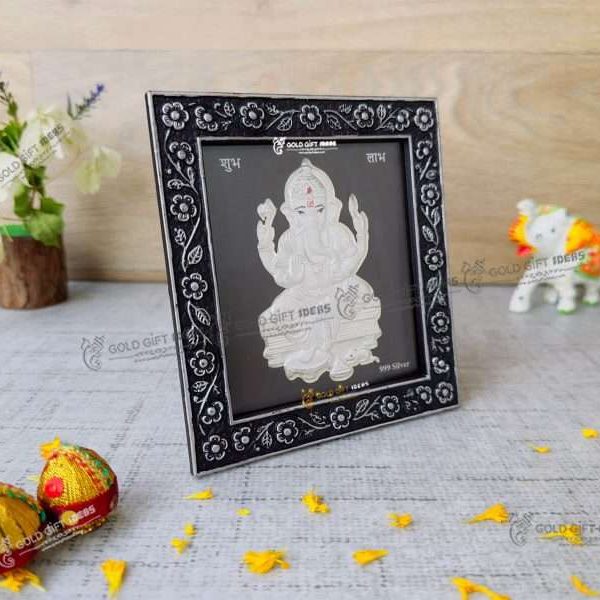 999 silver Ganesh frame, silver Ganesh photo frame, pure silver god photo frames, ganesha photo frame, silver ganesha frame, gold Ganesha frame, lord Ganesha frame, Ganesha frame with charan paduka, return gifts, Ganesha wooden photo frame, ganpati photo frame, Ganesh photo with mantra, ganesh photo with frame, ganesh photo with name, Ganpati photo hd, return gifts for wedding, return gifts for pooja