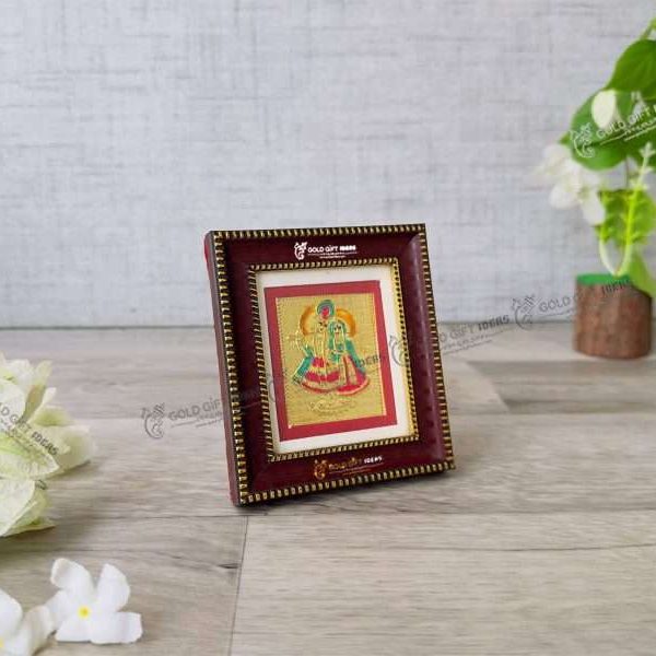 Silver Radha Krishna photo frame, radha Krishna silver frame silver radha krishna idol silver gift items return gifts for housewarming silver pooja items silver gift articles Radha Krishna photo frame, radha Krishna photo frame gift, radha Krishna wooden frame, radha Krishna frame with charan paduka, return gifts for wedding, return gifts for pooja
