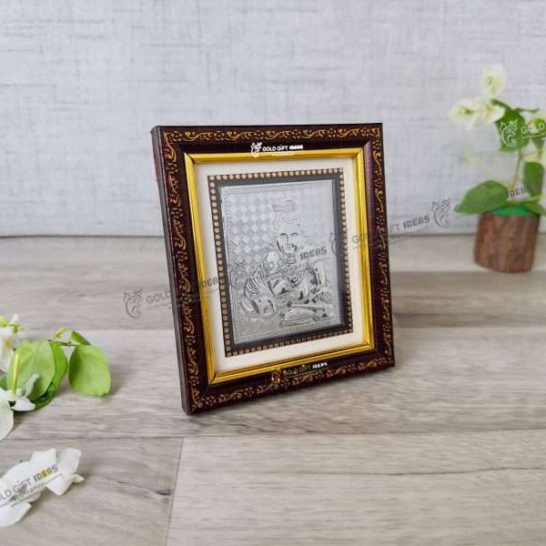Silver Bal Gopal Frame silver bal krishna murti silver krishna frame silver bal gopal murti silver gift items for pooja silver gift items return gifts for baby shower silver bal gopal frame for gift Bal gopal photo frame, bal gopal wooden photo frame, bal gopal frame with mantra, bal gopal photo with quotes, bal gopal photo with mantra, bal gopal statue, return gifts