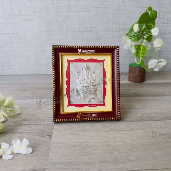 999 silver Ganesh frame, silver Ganesh photo frame, pure silver god photo frames, ganesha photo frame, silver ganesha frame, gold Ganesha frame, lord Ganesha frame, Ganesha frame with charan paduka, return gifts, Ganesha wooden photo frame, ganpati photo frame, Ganesh photo with mantra, ganesh photo with frame, ganesh photo with name, Ganpati photo hd, return gifts for wedding, return gifts for pooja