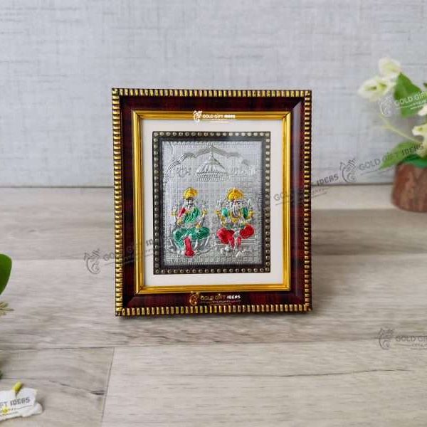Laxmi ganesh silver frame, silver gift items return gifts for housewarming silver pooja items silver gift articles Lakshmi ganesh photo frames lakshmi Ganesh photo hd lakshmi ganesh photo Diwali laxmi Ganesha photo, laxmi ganesh wooden photo frame, return gifts for Diwali puja, return gifts for housewarming