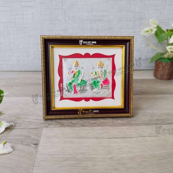Laxmi ganesh silver frame, silver gift items return gifts for housewarming silver pooja items silver gift articles Lakshmi ganesh photo frames lakshmi Ganesh photo hd lakshmi ganesh photo Diwali laxmi Ganesha photo, laxmi ganesh wooden photo frame, return gifts for Diwali puja, return gifts for housewarming