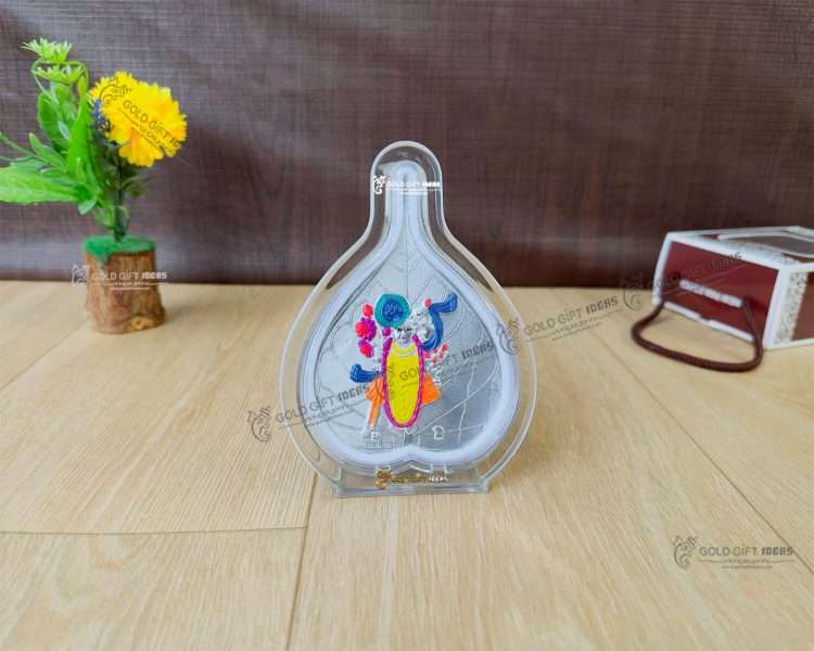 Pure 999 Silver Leaf Shape Shreenathji Photo Frame (1) silver shreenathji frame shrinathji silver idol pure silver shreenathji photo frame Shreenathji photo frame, shreenathji photo frame nathdwara, shrinathji photo frame, shreenathji frame with charanpaduka, shreenathji photo frame for gift, return gifts for housewarming, return gifts for pooja, Wooden Momento Gift