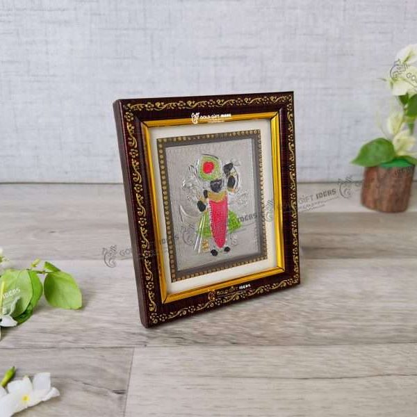 silver shreenathji frame shrinathji silver idol pure silver shreenathji photo frame Shreenathji photo frame, shreenathji photo frame nathdwara, shrinathji photo frame, shreenathji frame with charanpaduka, shreenathji photo frame for gift, return gifts for housewarming, return gifts for pooja, Wooden Momento Gift