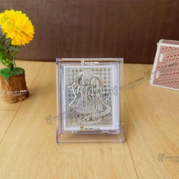 Silver Radha Krishna photo frame, radha Krishna silver frame silver radha krishna idol silver gift items return gifts for housewarming silver pooja items silver gift articles Radha Krishna photo frame, radha Krishna photo frame gift, radha Krishna wooden frame, radha Krishna frame with charan paduka, return gifts for wedding, return gifts for pooja