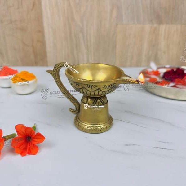 Brass Diya Stand, Brass Diya Lamp, Brass Diya for Puja, Brass Diyas for Diwali, Decorative Diya for Gifting, Oil Lamp for Home, Oil Lamp for Pooja, Brass Oil Lamp Stand, brass big diyas, brass diya with handle, brass aarti diya, return gifts for pooja, diwali gift, diwali return gift, birthday return gift, return gifts, wedding gift, wedding return gift, baby shower gift, baby shower return gift, occasional gift, housewarming gift, housewarming return gift