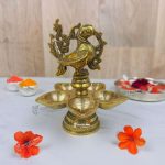 Brass Peacock Diya Stand, Brass Diya Stand, Brass Diya Lamp, Brass Diya for Puja, Brass Diyas for Diwali, Decorative Diya for Gifting, Oil Lamp for Home, Oil Lamp for Pooja, Brass Oil Lamp Stand, brass big diyas, brass diya with handle, brass aarti diya, return gifts for pooja, diwali gift, diwali return gift, birthday return gift, return gifts, wedding gift, wedding return gift, baby shower gift, baby shower return gift, occasional gift, housewarming gift, housewarming return gift