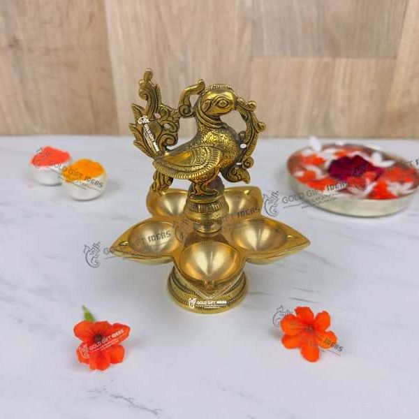 Brass Peacock Diya Stand, Brass Diya Stand, Brass Diya Lamp, Brass Diya for Puja, Brass Diyas for Diwali, Decorative Diya for Gifting, Oil Lamp for Home, Oil Lamp for Pooja, Brass Oil Lamp Stand, brass big diyas, brass diya with handle, brass aarti diya, return gifts for pooja, diwali gift, diwali return gift, birthday return gift, return gifts, wedding gift, wedding return gift, baby shower gift, baby shower return gift, occasional gift, housewarming gift, housewarming return gift