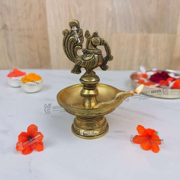 Brass Peacock Diya Stand, Brass Diya Stand, Brass Diya Lamp, Brass Diya for Puja, Brass Diyas for Diwali, Decorative Diya for Gifting, Oil Lamp for Home, Oil Lamp for Pooja, Brass Oil Lamp Stand, brass big diyas, brass diya with handle, brass aarti diya, return gifts for pooja, diwali gift, diwali return gift, birthday return gift, return gifts, wedding gift, wedding return gift, baby shower gift, baby shower return gift, occasional gift, housewarming gift, housewarming return gift