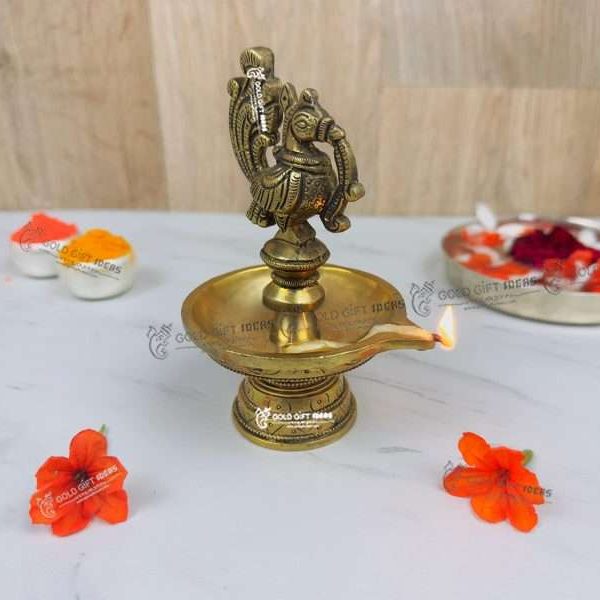 Brass Peacock Diya Stand, Brass Diya Stand, Brass Diya Lamp, Brass Diya for Puja, Brass Diyas for Diwali, Decorative Diya for Gifting, Oil Lamp for Home, Oil Lamp for Pooja, Brass Oil Lamp Stand, brass big diyas, brass diya with handle, brass aarti diya, return gifts for pooja, diwali gift, diwali return gift, birthday return gift, return gifts, wedding gift, wedding return gift, baby shower gift, baby shower return gift, occasional gift, housewarming gift, housewarming return gift