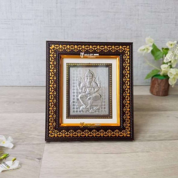 999 silver Ganesh frame, silver Ganesh photo frame, pure silver god photo frames, ganesha photo frame, silver ganesha frame, gold Ganesha frame, lord Ganesha frame, Ganesha frame with charan paduka, return gifts, Ganesha wooden photo frame, ganpati photo frame, Ganesh photo with mantra, ganesh photo with frame, ganesh photo with name, Ganpati photo hd, return gifts for wedding, return gifts for pooja