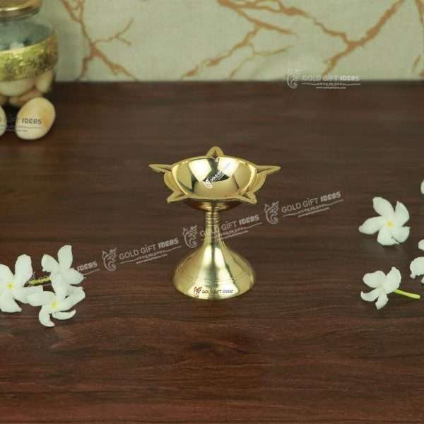 brass diya, brass diya stand, brass diya for pooja, brass diya with cover, brass diya for return gift, brass diya for aarti, brass diya for gifting, brass diya for temple, brass diya for navratri, brass diya for akhand jyoti, brass diya for pooja room, diya for diwali, diya for gift, diya for decoration, diya for rangoli, diya for puja, brass oil lamp, brass oil burner, oil lamp for pooja, return gifts for pooja, diwali gift, diwali return gifts, birthday return gifts, return gifts, wedding return gifts, baby shower return gifts, occasional gifts, housewarming gift, housewarming return gifts