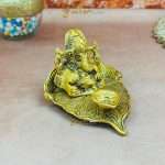 Gold Plated Pan Shape Ganesha Diya (1) ganesha on leaf, lord ganesha on leaf, ganesha sitting on leaf, metal ganesha on leaf, ganesh idol on leaf, ganesh ji on leaf, ganpati on leaf, ganpati bappa on leaf, ganesh idol for home, ganesh idol for home vastu, ganesh idol for home decor, ganesh idol for office, ganesh idol for office desk, ganesh idol for study table, ganesh murti for home, ganesh murti for gift, ganesh murti for office, ganesh statue for home, ganesh statue for gift, ganesh statue for office, ganesh statue for ganesh chaturthi, ganesh statue for temple, ganesha idol for home, ganesha idol for gift, ganesha idol for office, ganesha idol for office desk, ganesha idol for home decor, ganesha idol for study table, ganesha idol for pooja room, ganesha murti for home, ganesha murti for ganesh chaturthi, ganesha statue for gift, ganesha statue for home decor, ganesha statue for home, ganesha statue for pooja room, ganesha statue for ganesh chaturthi, ganesha statue for home vastu, ganpati idol for home decor, ganpati idol for home, ganpati idol for office desk, ganpati idol for gift, ganpati idol for office, ganpati murti for home, ganpati murti for ganesh chaturthi, ganpati murti for gift, ganpati statue for gift, ganpati statue for home, return gifts for pooja, diwali gift, diwali return gift, birthday gift, birthday return gift, return gifts, wedding gift, wedding return gift, baby shower gift, baby shower return gift, occasional gift, housewarming gifts, housewarming return gifts,