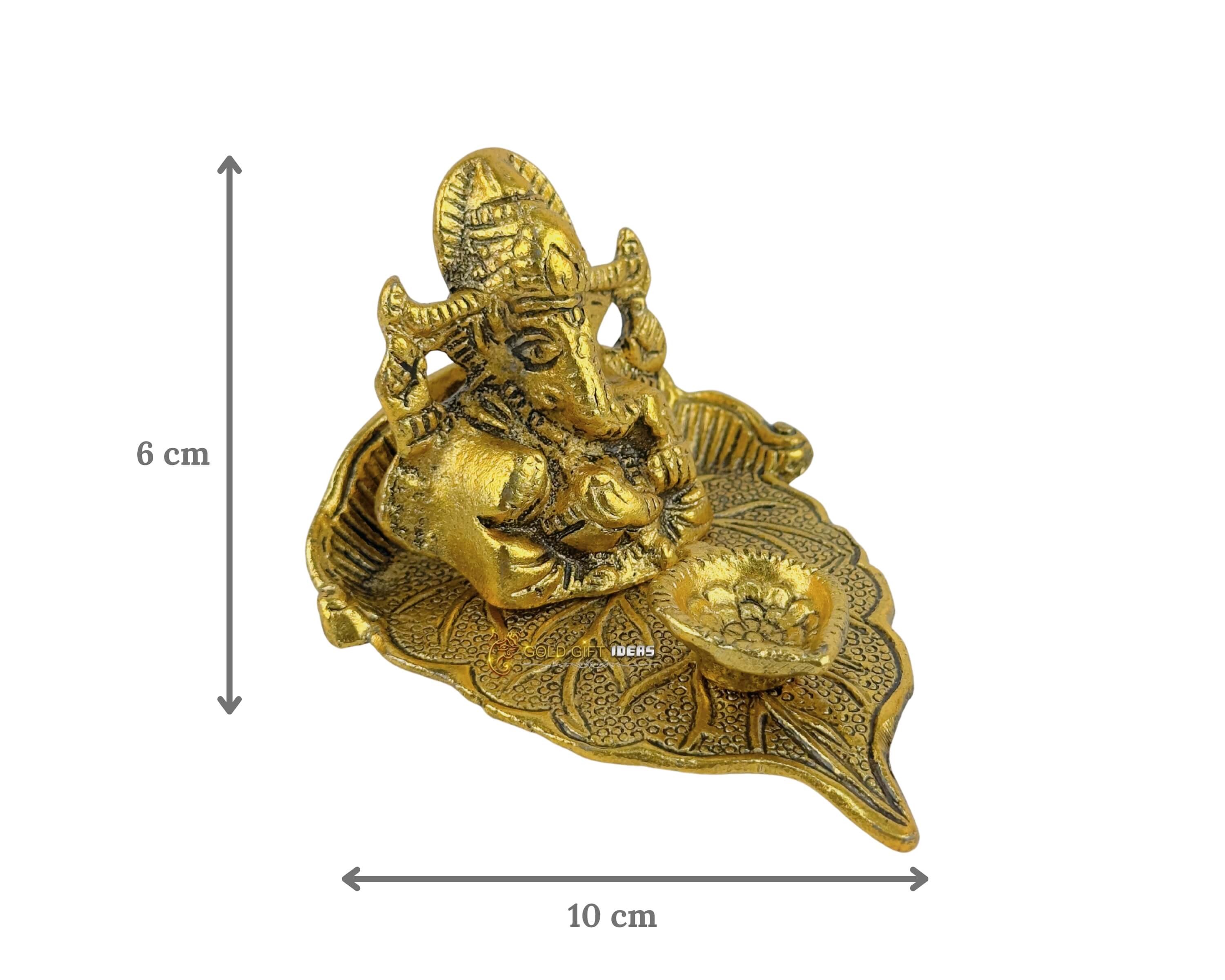 Gold Plated Pan Shape Ganesha Diya (3) ganesha on leaf, lord ganesha on leaf, ganesha sitting on leaf, metal ganesha on leaf, ganesh idol on leaf, ganesh ji on leaf, ganpati on leaf, ganpati bappa on leaf, ganesh idol for home, ganesh idol for home vastu, ganesh idol for home decor, ganesh idol for office, ganesh idol for office desk, ganesh idol for study table, ganesh murti for home, ganesh murti for gift, ganesh murti for office, ganesh statue for home, ganesh statue for gift, ganesh statue for office, ganesh statue for ganesh chaturthi, ganesh statue for temple, ganesha idol for home, ganesha idol for gift, ganesha idol for office, ganesha idol for office desk, ganesha idol for home decor, ganesha idol for study table, ganesha idol for pooja room, ganesha murti for home, ganesha murti for ganesh chaturthi, ganesha statue for gift, ganesha statue for home decor, ganesha statue for home, ganesha statue for pooja room, ganesha statue for ganesh chaturthi, ganesha statue for home vastu, ganpati idol for home decor, ganpati idol for home, ganpati idol for office desk, ganpati idol for gift, ganpati idol for office, ganpati murti for home, ganpati murti for ganesh chaturthi, ganpati murti for gift, ganpati statue for gift, ganpati statue for home, return gifts for pooja, diwali gift, diwali return gift, birthday gift, birthday return gift, return gifts, wedding gift, wedding return gift, baby shower gift, baby shower return gift, occasional gift, housewarming gifts, housewarming return gifts,