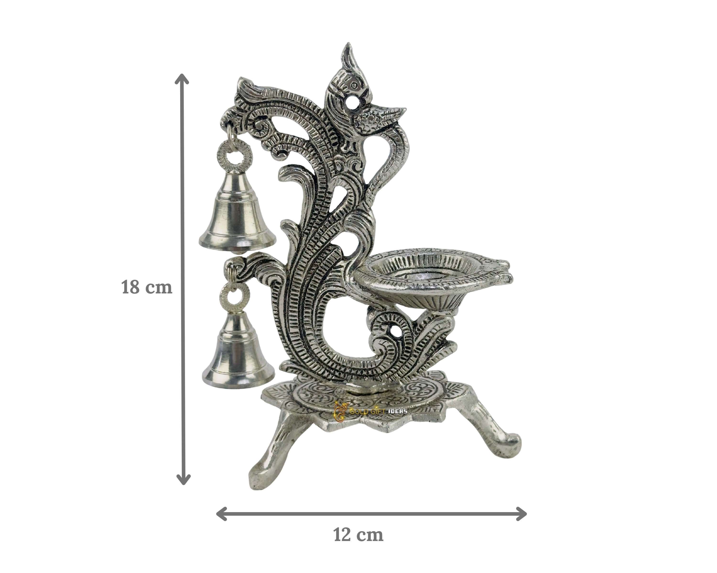 Silver Plated Peacock Stand Diya (2) peacock diya decoration, peacock diya design, peacock hanging diya, peacock design diya, peacock design diya decoration, peacock wala diya, peacock shape diya, peacock samai diya, hanging peacock diya, peacock diya for diwali, peacock diya decoration for diwali, diya peacock decoration, diya peacock lamp, return gifts for pooja, diwali gift, diwali return gift, birthday gift, birthday return gift, return gifts, wedding gift, wedding return gift, baby shower gift, baby shower return gift, occasional gift, housewarming gifts, housewarming return gifts,